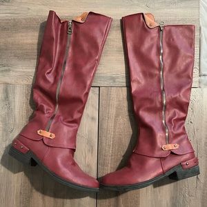 Brand new boots never worn. Size 9. Not real leather. Maroon color.